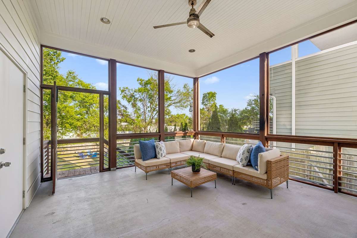 As if the rooftop decks weren't enough - there's also a sunny screened porch on the ground level!