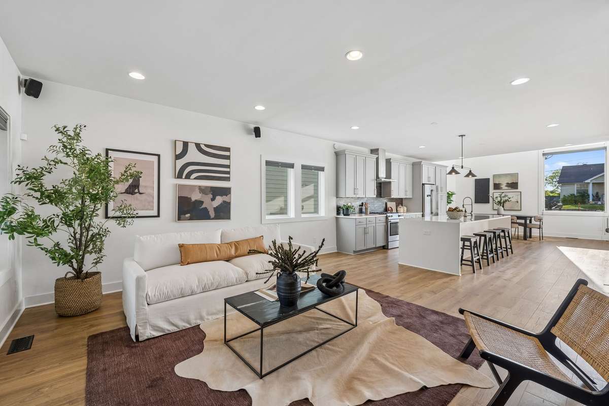 The living room is already wired with additional speakers for a home theater experience.