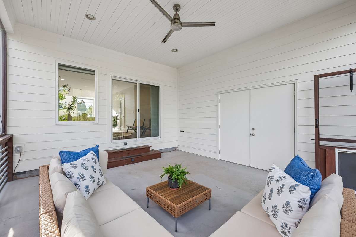 A large exterior storage closet is conveniently built into the porch.