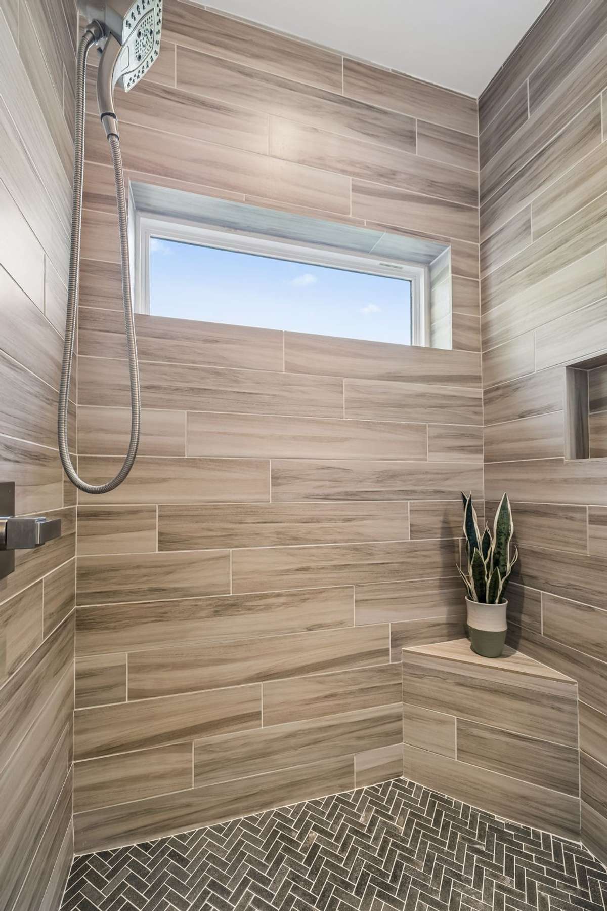Look forward to rinsing off in the luxurious walk-in shower!