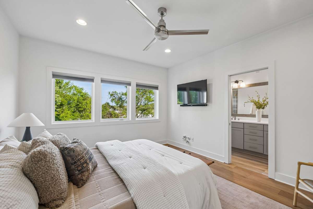 The tall trees framing the window offer a lovely view!