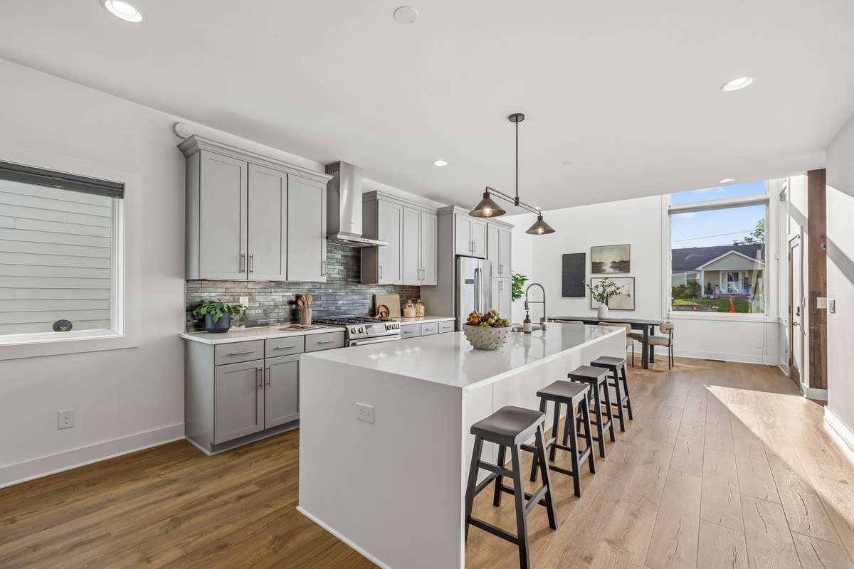 The breakfast bar is the perfect spot for casual meals or your morning coffee.