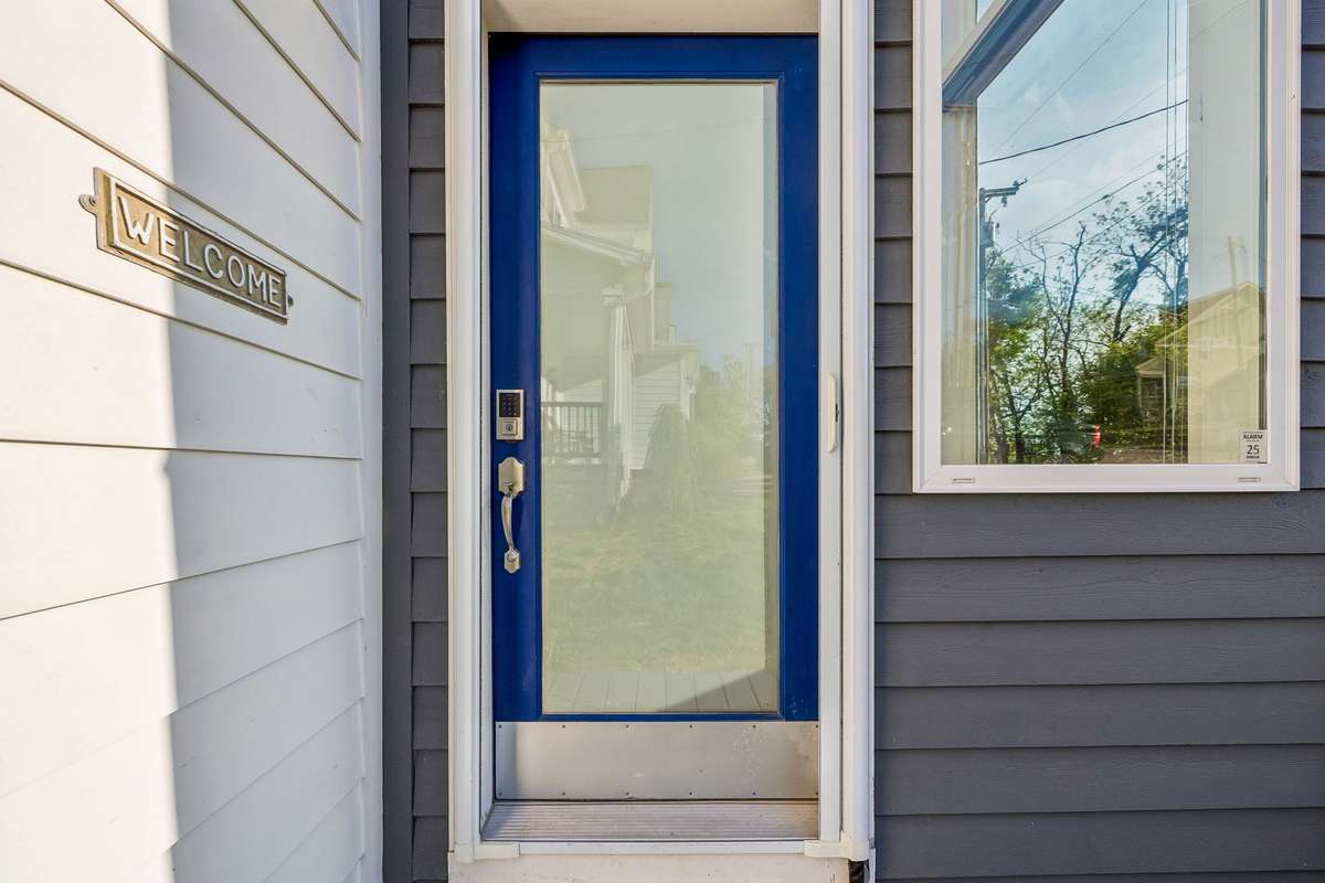 The cheerful blue door makes a great first impression on guests!