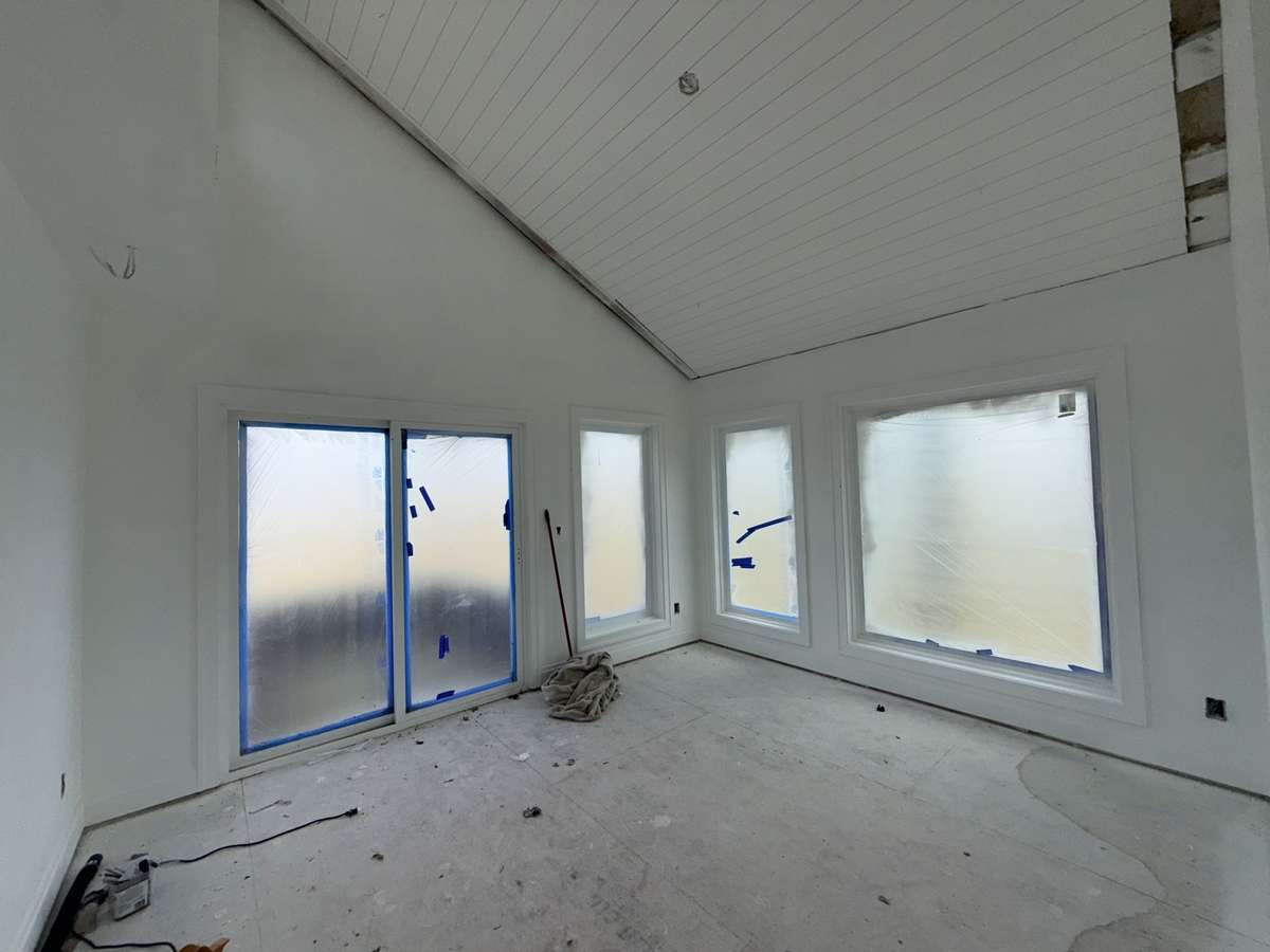 First bedroom has full bath, lots of natural light and private balcony.