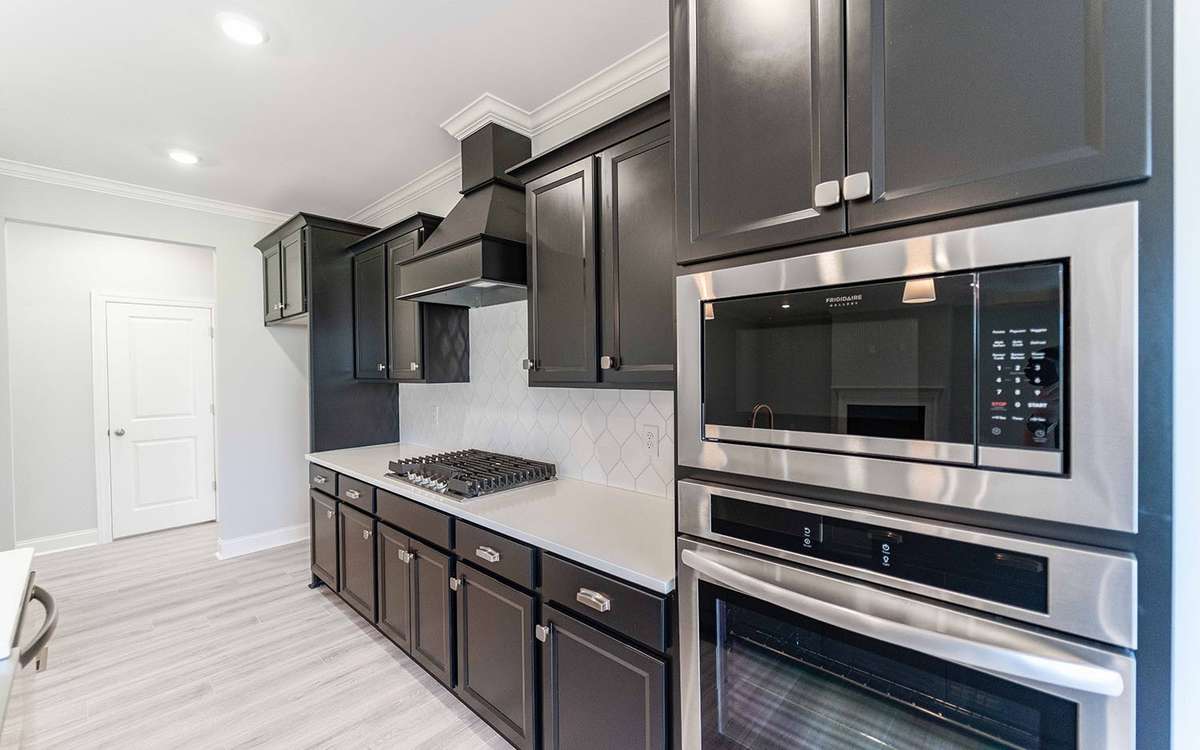 Photos are from another home with the same plan and are for representative purposes only.  Exterior and interior selections and upgrades may vary.