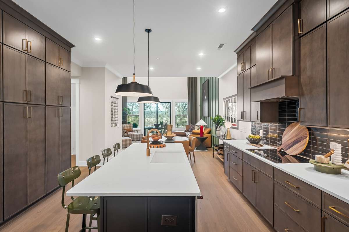 Photos shown are of a model home and are for illustrative purposes only. Features, finishes, colors, and options will vary from the actual home.