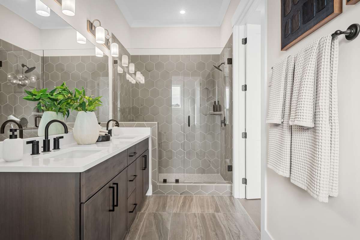 Photos shown are of a model home and are for illustrative purposes only. Features, finishes, colors, and options will vary from the actual home.