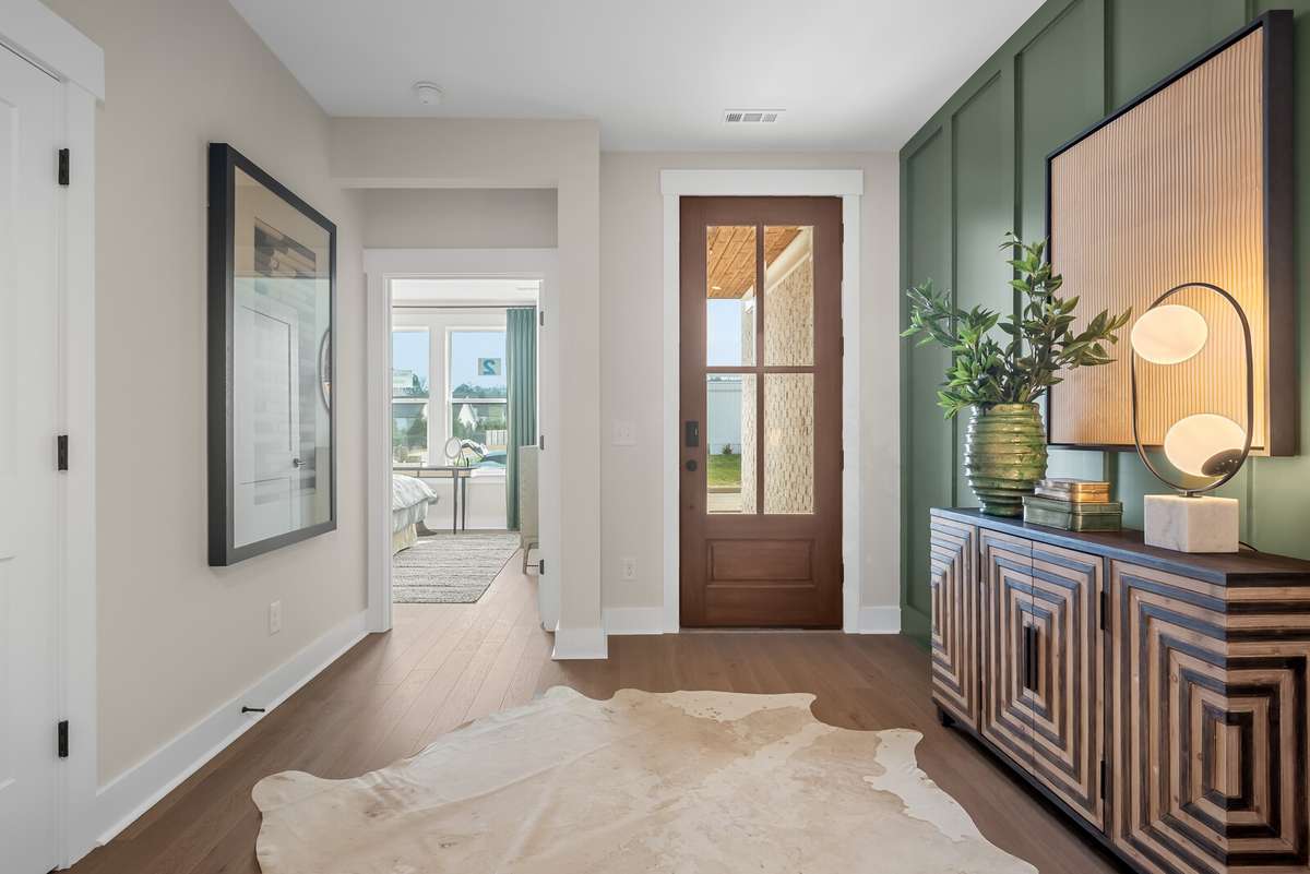 Photos shown are of a model home and are for illustrative purposes only. Features, finishes, colors, and options will vary from the actual home.
