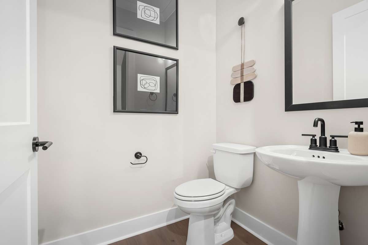 Photos shown are of a model home and are for illustrative purposes only. Features, finishes, colors, and options will vary from the actual home.