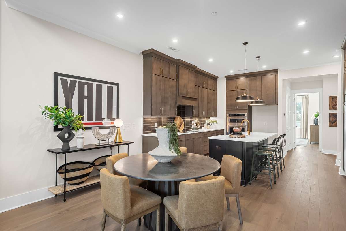 Photos shown are of a model home and are for illustrative purposes only. Features, finishes, colors, and options will vary from the actual home.