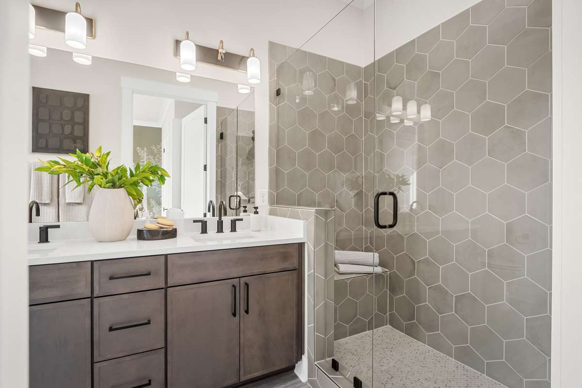 Photos shown are of a model home and are for illustrative purposes only. Features, finishes, colors, and options will vary from the actual home.