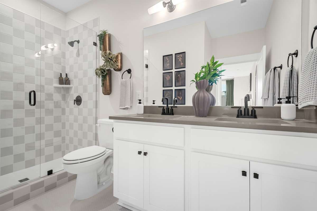 Photos shown are of a model home and are for illustrative purposes only. Features, finishes, colors, and options will vary from the actual home.