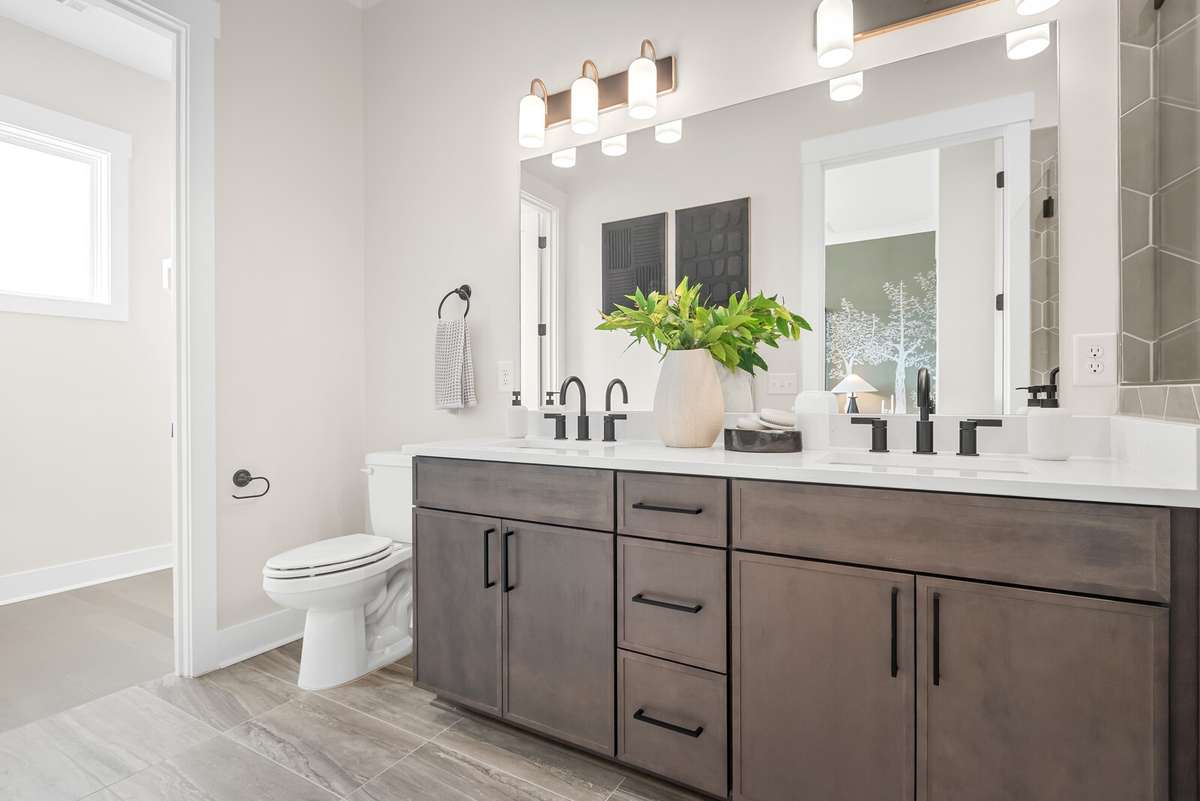 Photos shown are of a model home and are for illustrative purposes only. Features, finishes, colors, and options will vary from the actual home.