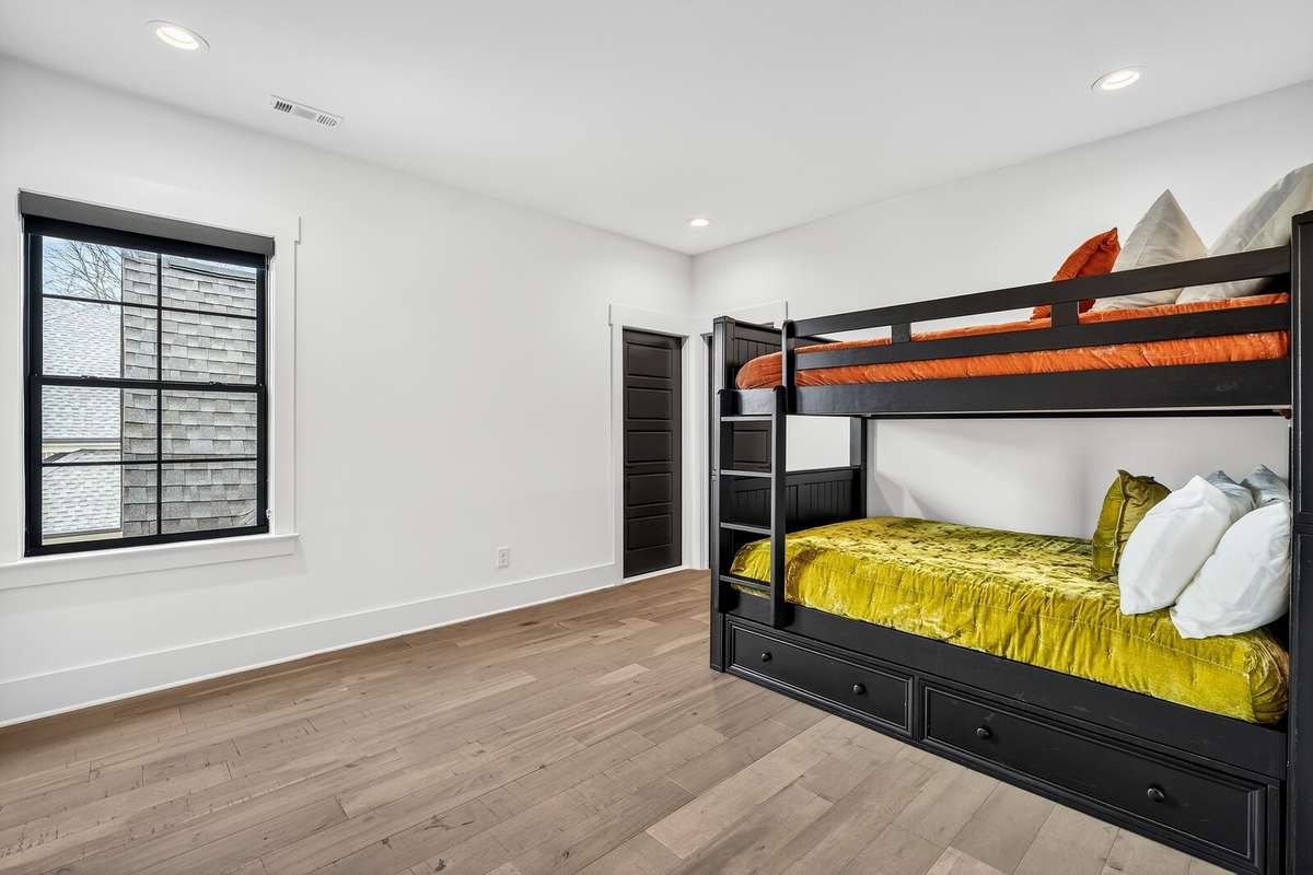 Upstairs Bedroom (shares Jack and Jill Bathroom) Also has access to large walk-out Storage Room