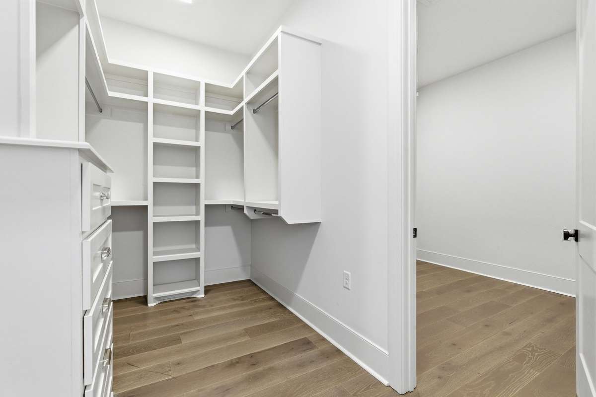 Massive conditioned storage/hobby room through walk in closet.