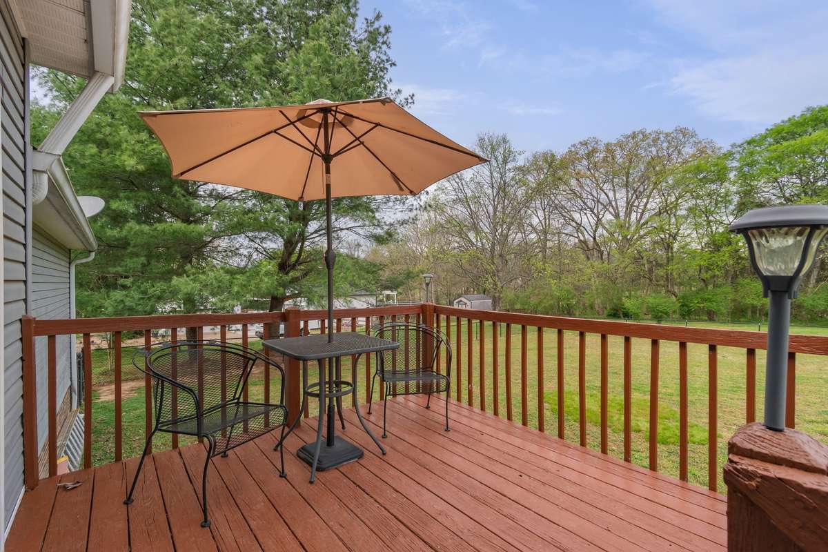 Step out onto the deck and enjoy peaceful views. Perfect for morning coffee or an evening unwind.