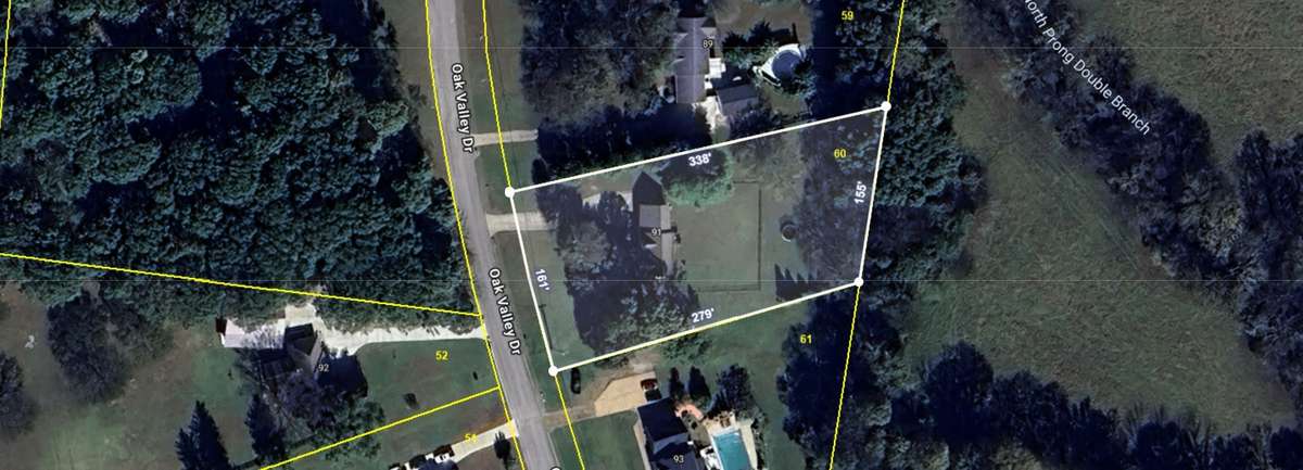 From above, 91 Oak Valley Dr offers a great look at the property’s space, layout, and peaceful surroundings.