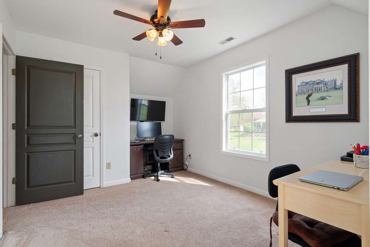 Another angle highlights the roomy layout and natural light, giving you plenty of options for work, play, or guests.