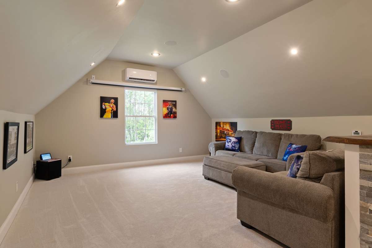 Recessed lighting and built-in audio/visual helps set the stage for movie nights and game days.