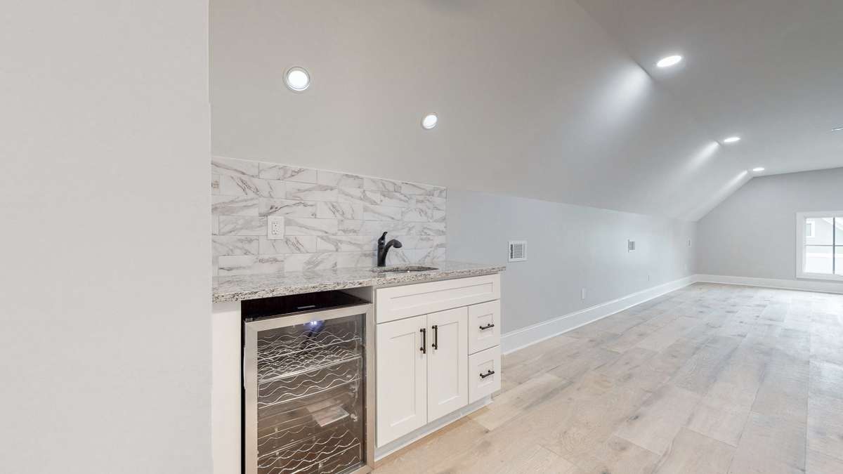 The Wet Bar welcomes you to the 3rd floor bedroom or rec room