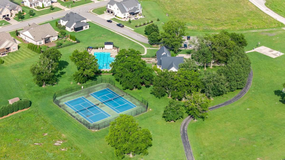 Tennis courts? Yes! Community pool? Yes!  HOA dues cover both.