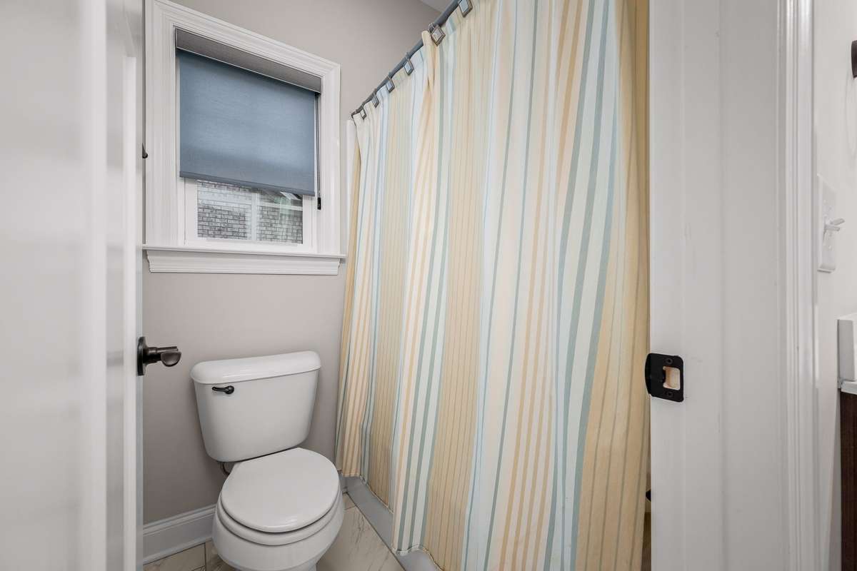 Photo of separate shower and toilet.
