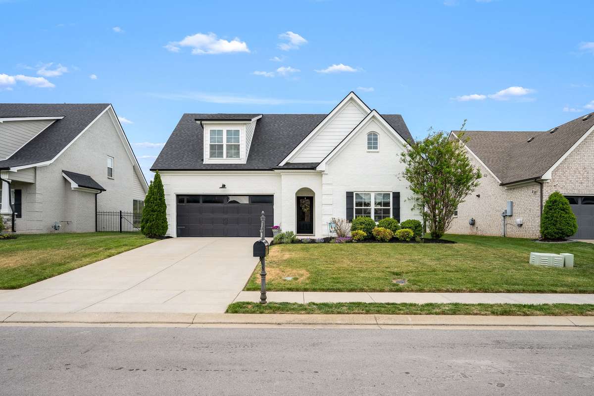 In this section of the neighborhood, mailboxes at the curb are the standard.  No central post for this street. Sidewalks run throughout the neighborhood.