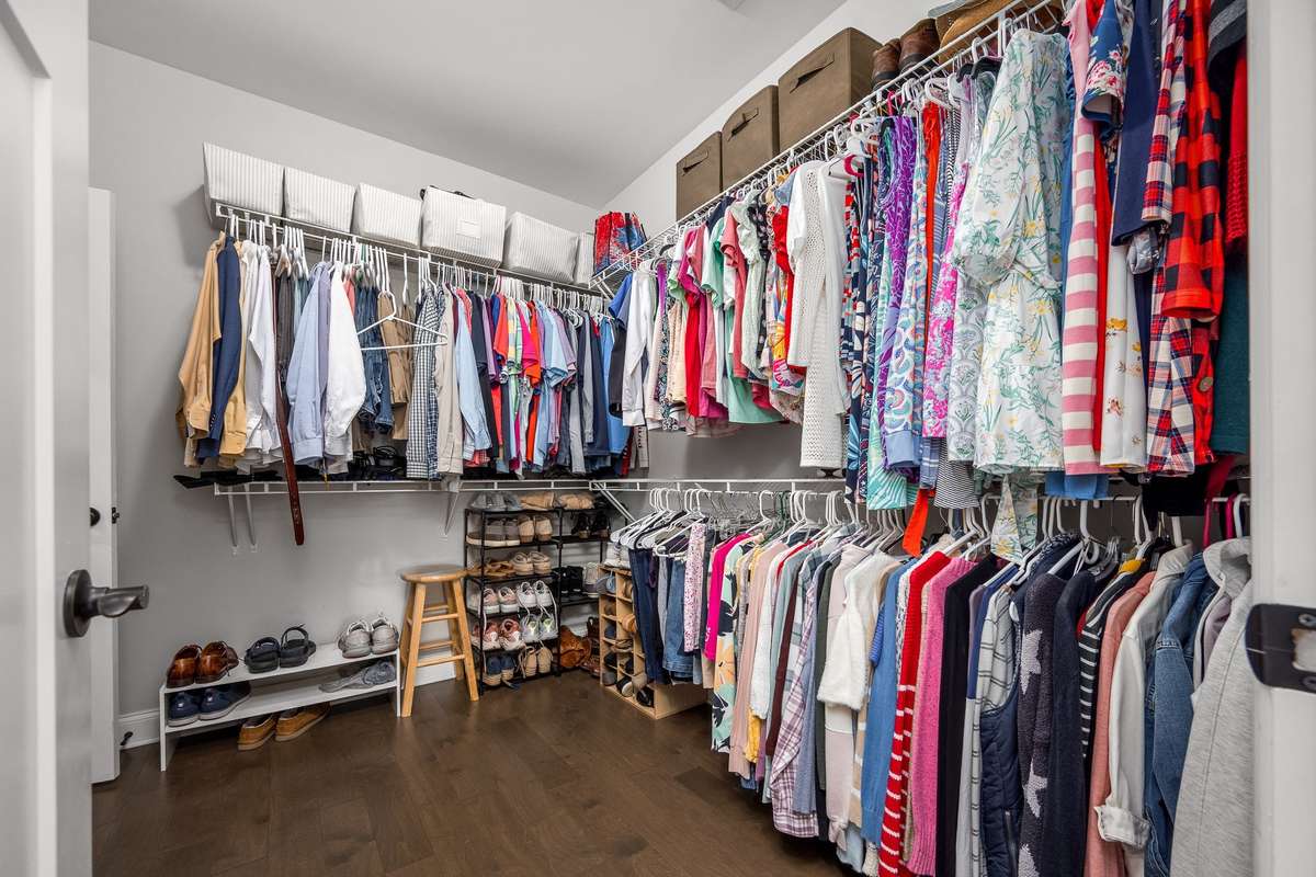 Look at the size of this closet! you will never want for more space.  And the best part about it is that it opens to drop zone/laundry area.