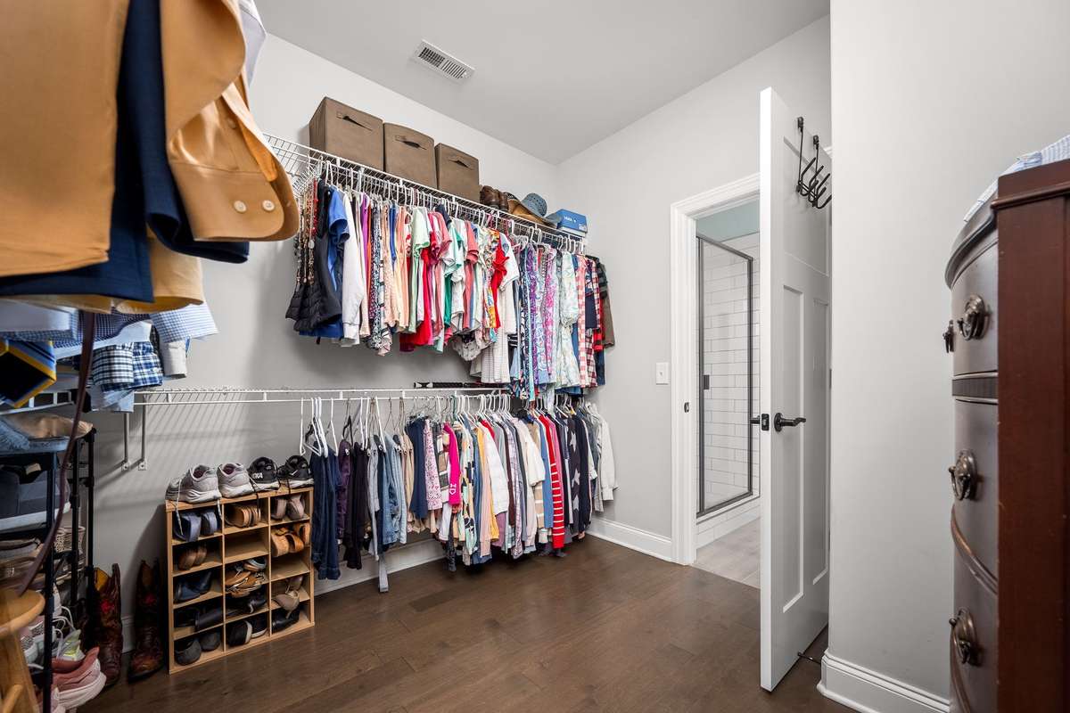 Walk through from primary bathroom to drop zone/laundry area.