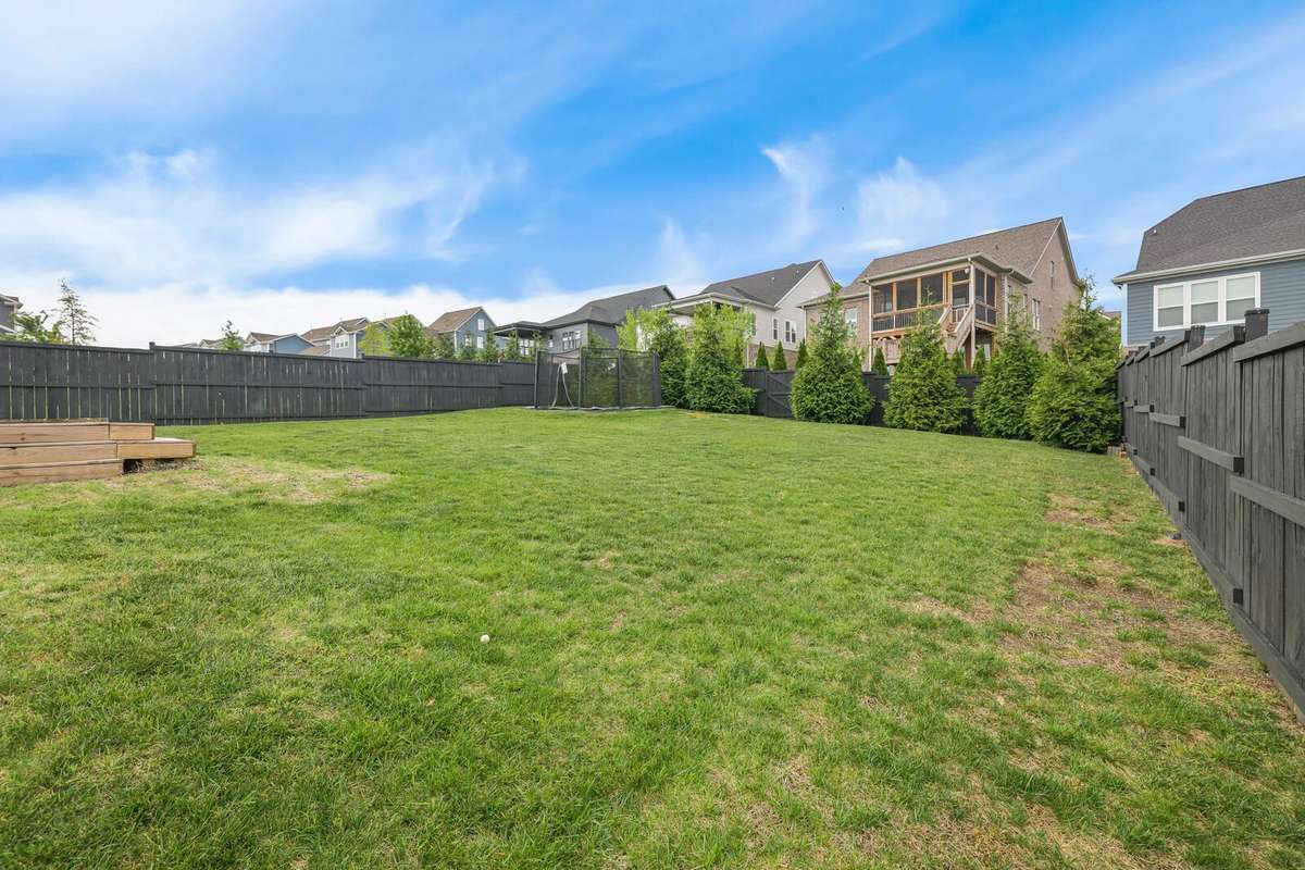 Enjoy a fenced, large flat back yard