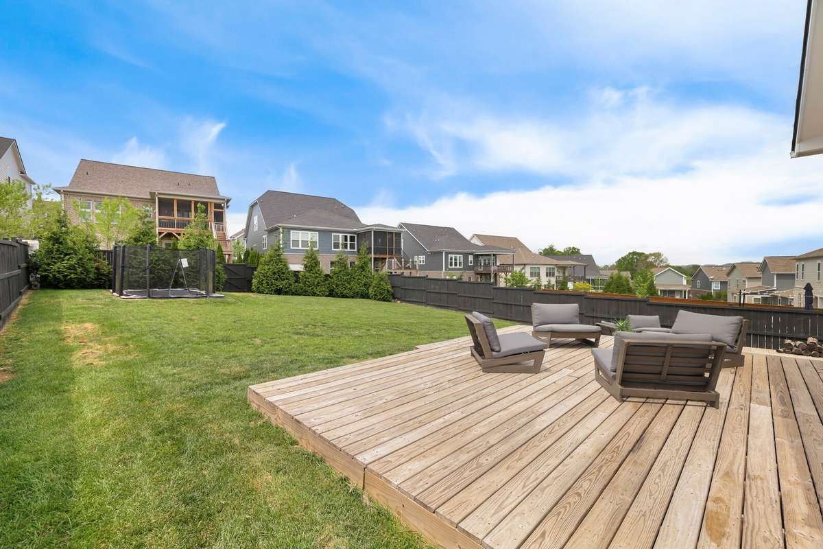Enjoy a large, flat backyard for play structures or entertaining options