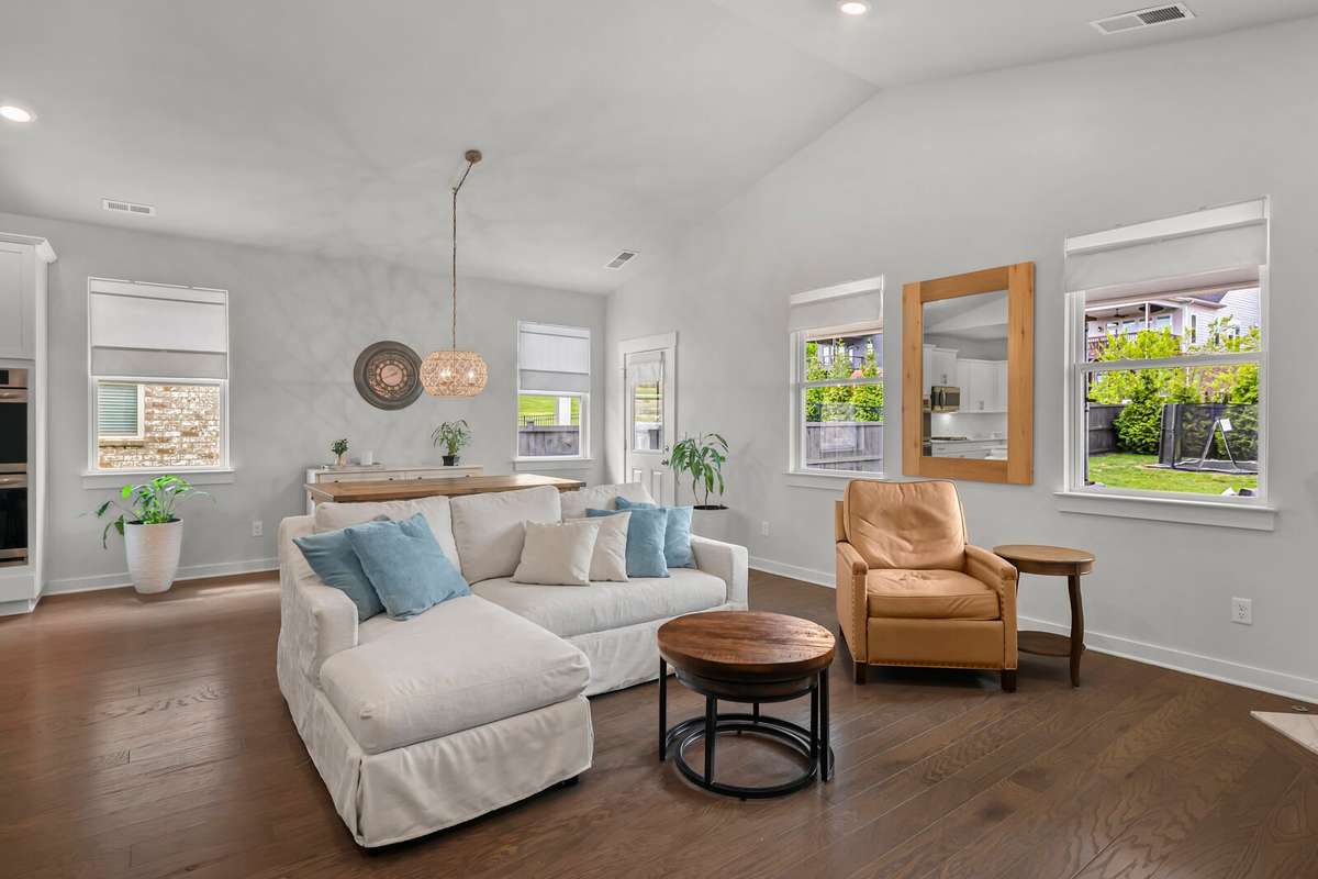 Note the abundance of windows and the hardwood floors through out