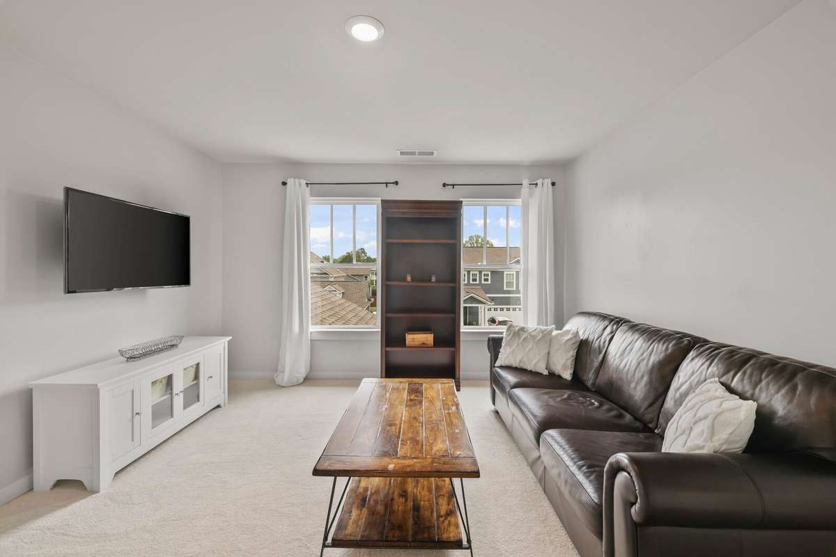 Upstairs bonus space enjoys large windows