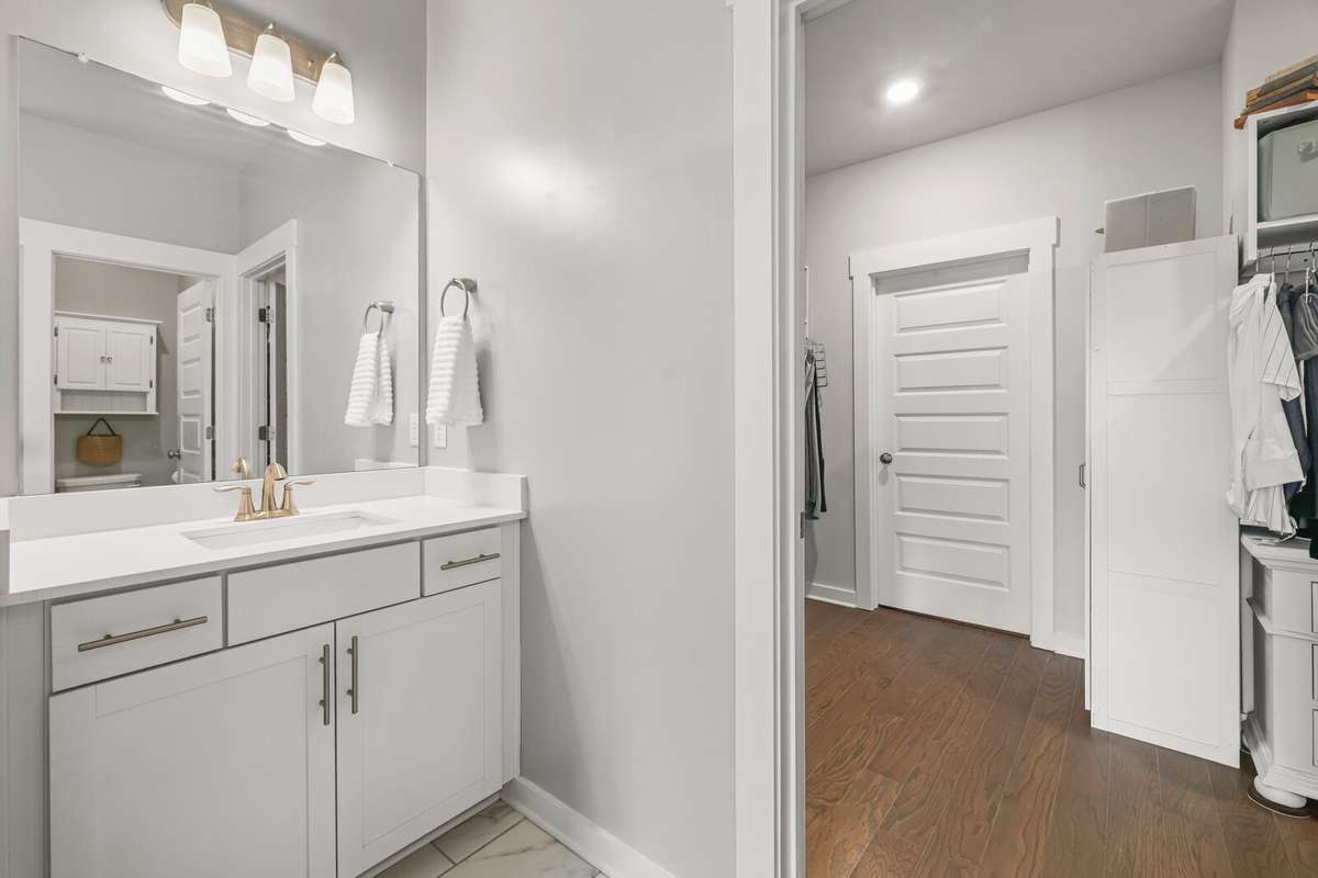 The extensive closet is located off the primary bath