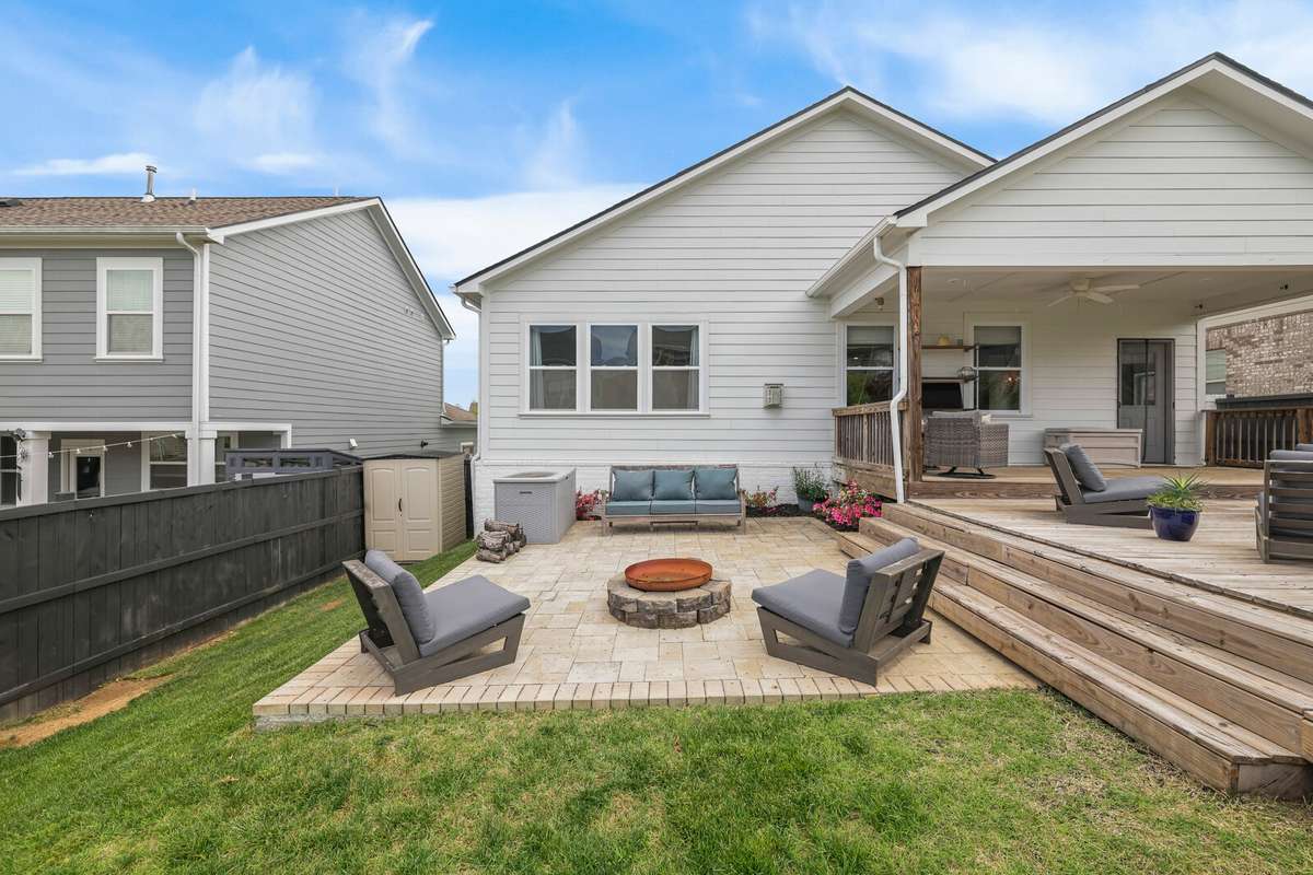 Gather round the firepit on the paved patio