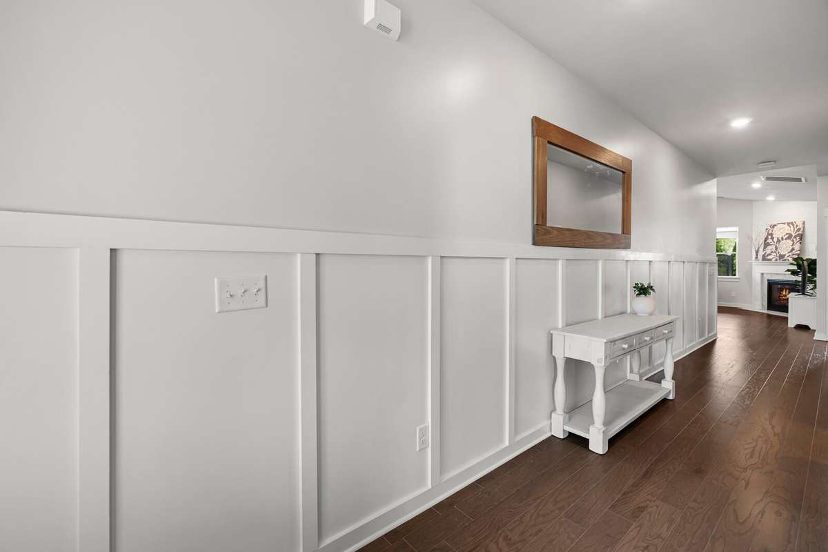 Inside you will be greeted with on trend details like board and batten paneling in the entry hall