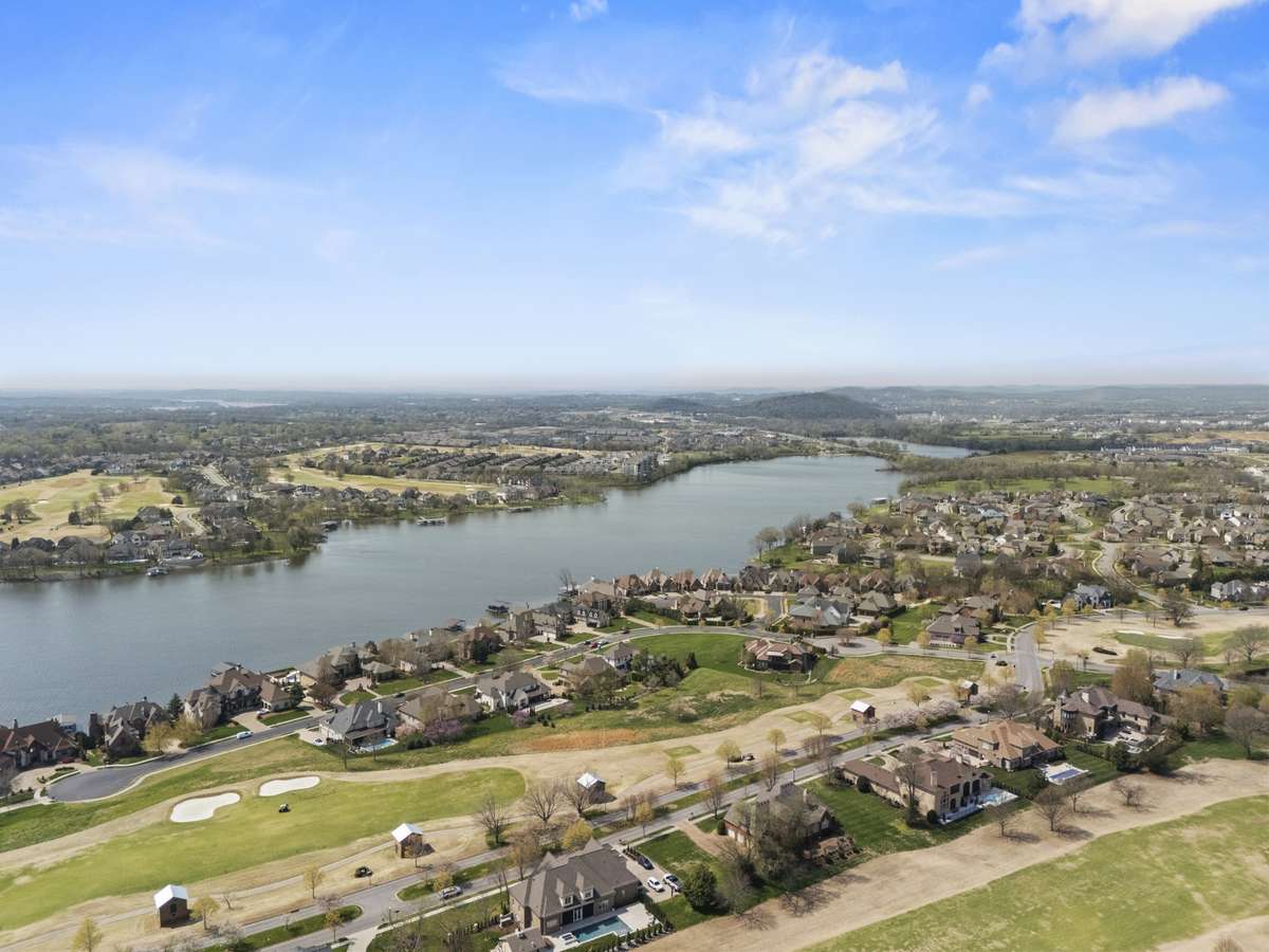 Expansive views showcasing the surrounding landscape, lake and community.