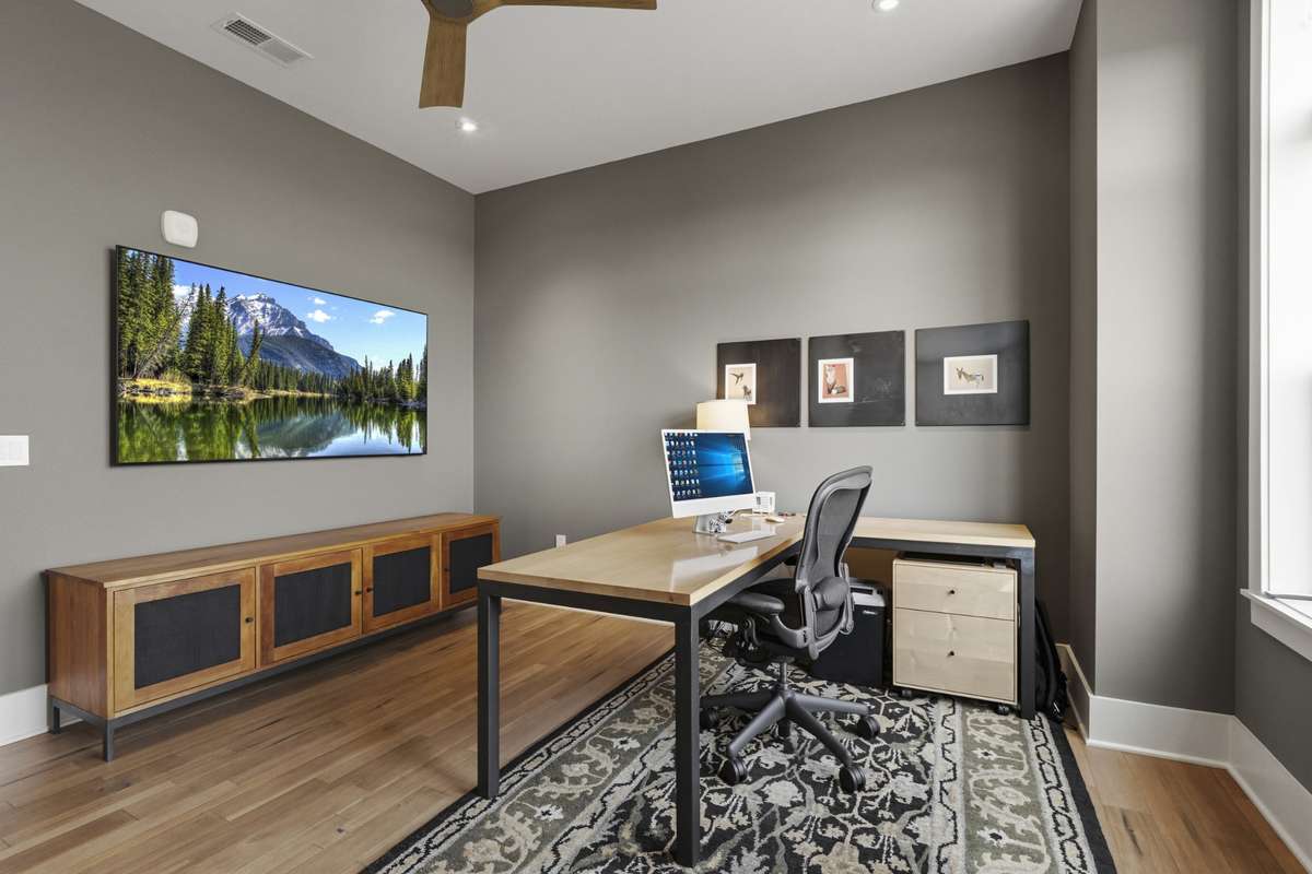 Versatile third bedroom perfect for a home office, guest room, or flex space.