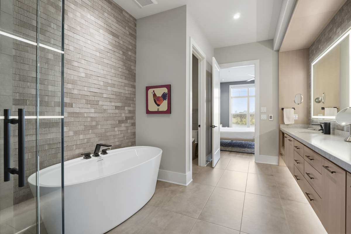 Thoughtfully designed bathroom layout connecting seamlessly to the primary suite.