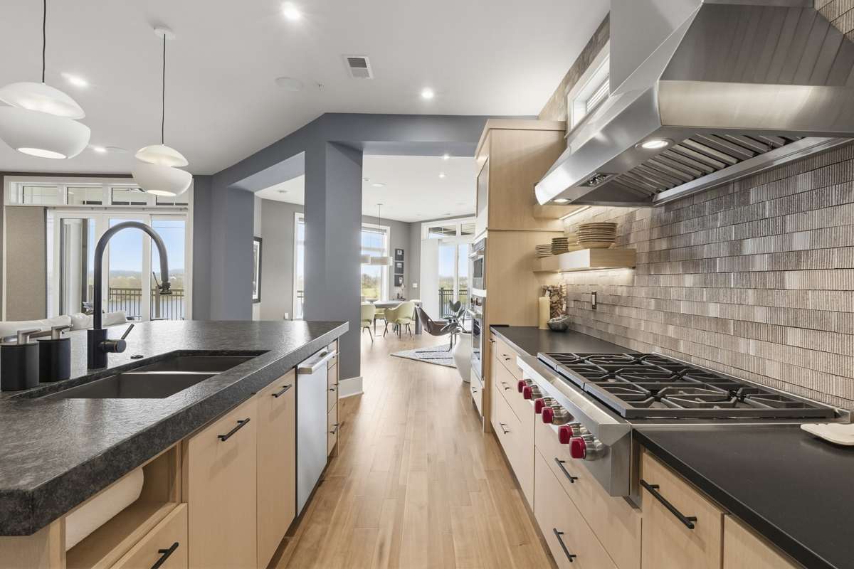 Functional and stylish layout with dual prep areas and seamless flow to living and dining.