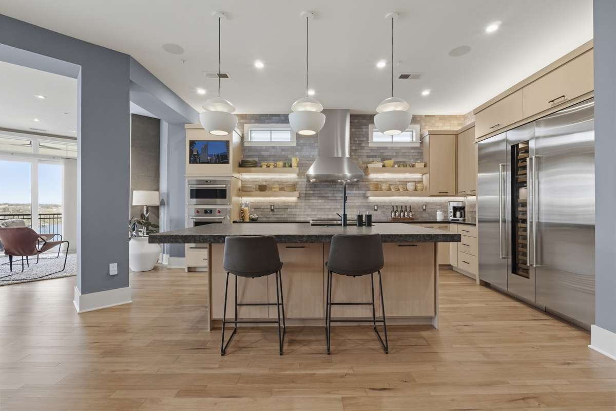Luxury chef’s kitchen featuring premium appliances, custom cabinetry, and an oversized island designed for entertaining.