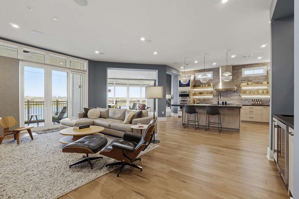 Open-concept living with seamless flow between kitchen, dining, and living spaces.