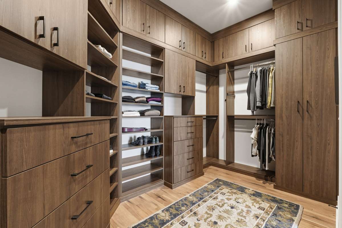 Ample storage space with custom cabinetry and thoughtfully designed layout.