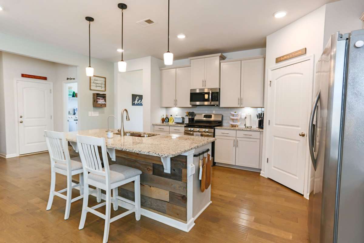 Don't want to eat at the kitchen table? No problem! Just cozy on up to the bar/island!
