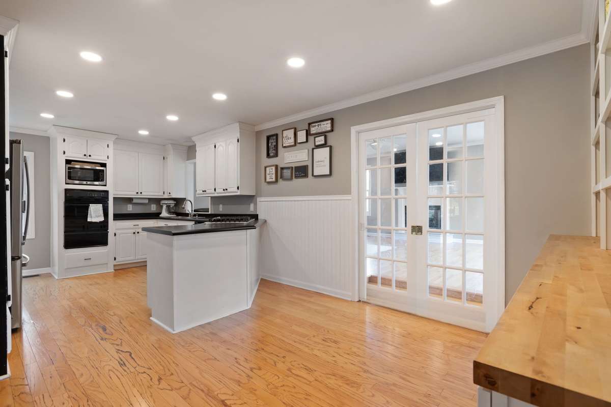 Close off the Den area with pocket doors