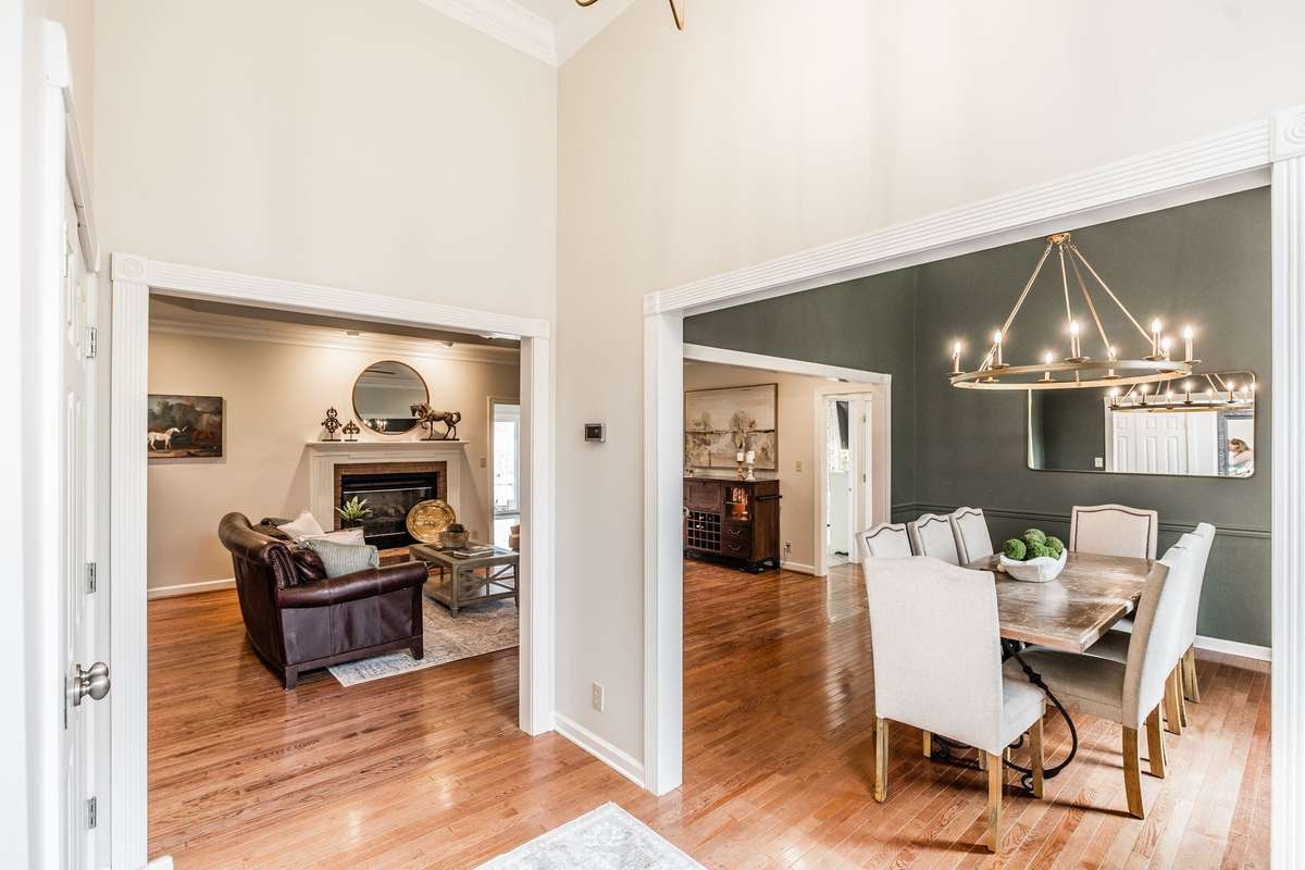 A view of the separate dining room and living room from the foyer area.