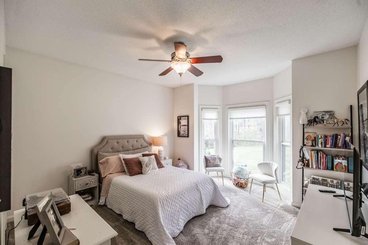 The 3rd bedroom has a sun filled bay window.