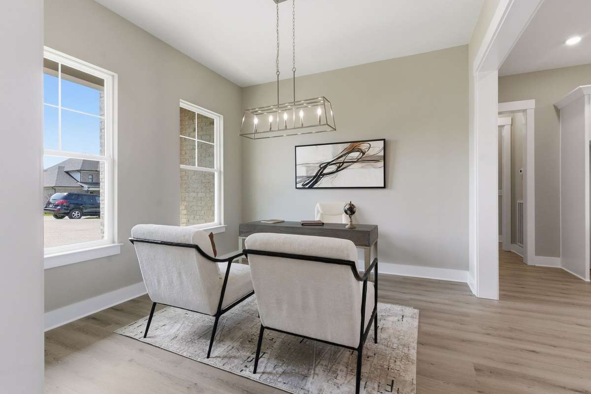 Just inside is a formal dining area that can also be used as an office.