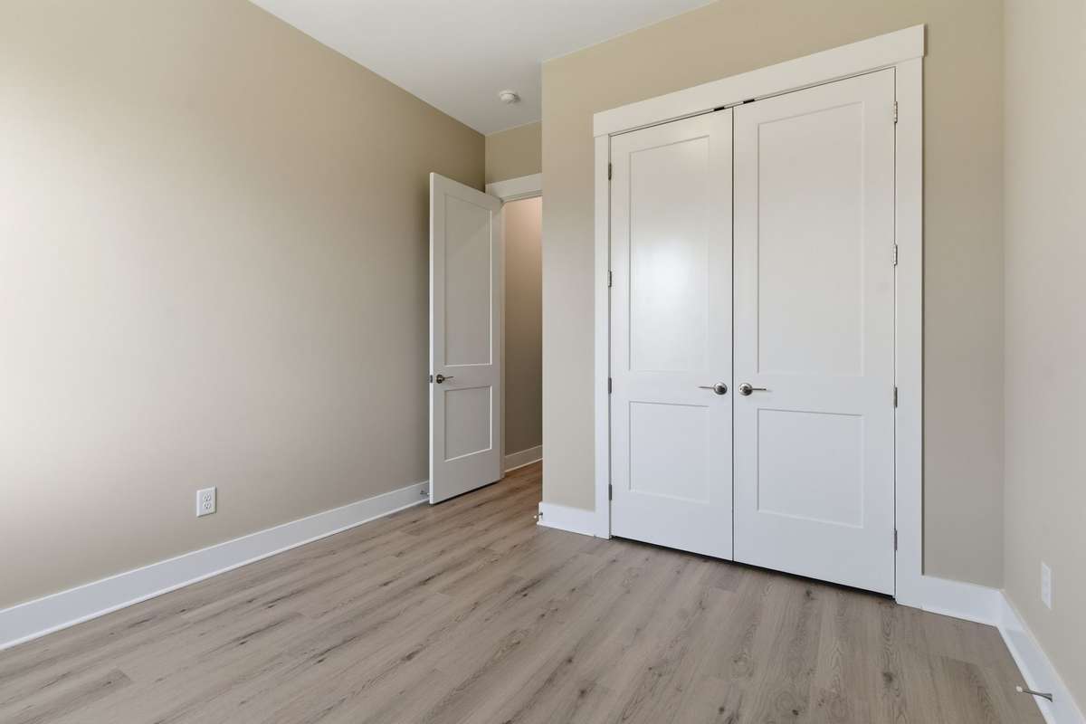 This home features a  large guest bedroom on the first floor.