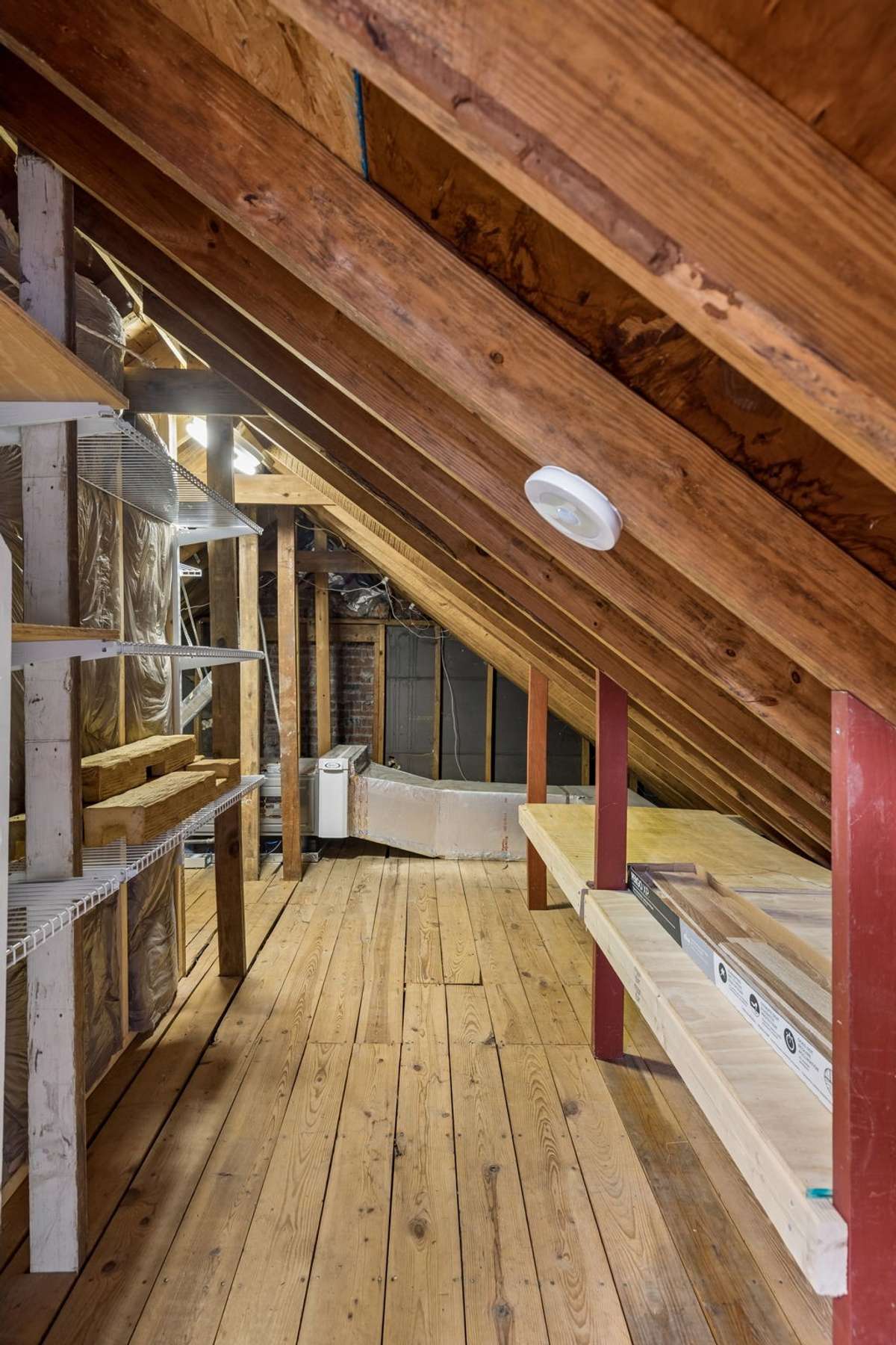 Unfinished attic space - more storage or opportunity to build out.